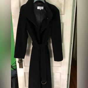 Very long wool / nylon / cashmere winter coat. Back has slit.
